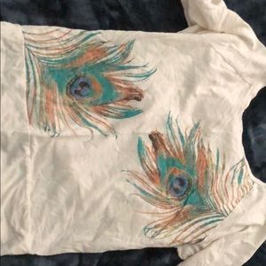 Peacock design white shirt.
